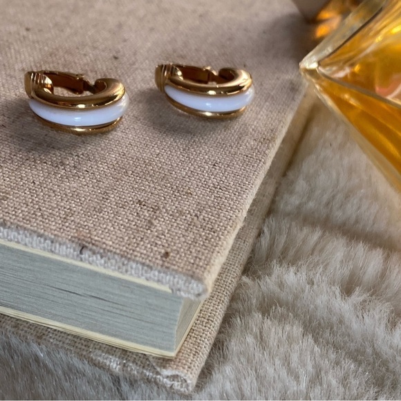 Beautiful dainty gold tone and white enamel vintage clip on earrings